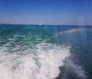 A rainbow in our wake
